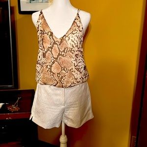 Animal print bodysuit never worn.  Perfect with white shorts/jeans.
